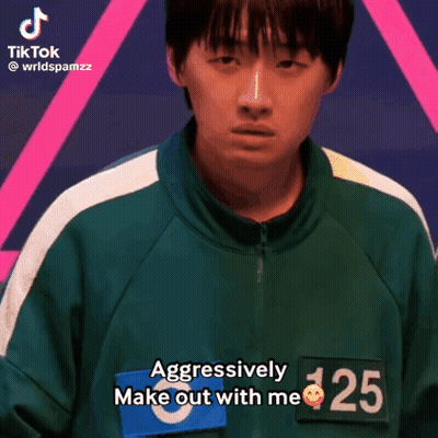 A Man In A Green Jacket With The Number 125 On It GIF