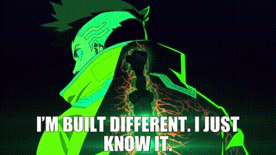 A Man In A Green Jacket With The Words I 'M Built Different I Just Know It GIF