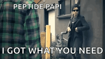 A Man In A Green Plaid Shirt Is Standing Next To A Man In A Black Coat . GIF