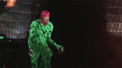 A Man In A Green Question Mark Costume GIF