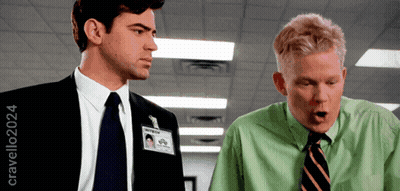 A Man In A Green Shirt Has A Name Tag On His Neck That Says ' William ' On It GIF