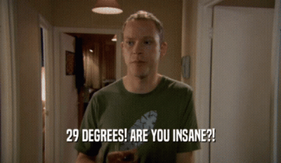 A Man In A Green Shirt Holds A Glass Of Beer And Says 29 Degrees Are You Insane GIF