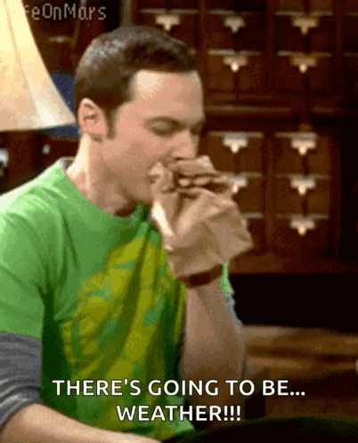 A Man In A Green Shirt Is Eating A Sandwich And Says There 'S Going To Be ... Weather !!! GIF