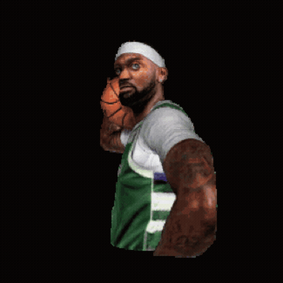A Man In A Green Shirt Is Holding A Basketball In His Right Hand GIF