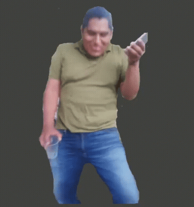 A Man In A Green Shirt Is Holding Two Cell Phones GIF