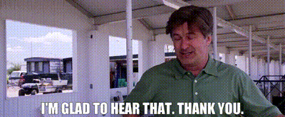 A Man In A Green Shirt Is Saying I 'M Glad To Hear That . Thank You . GIF