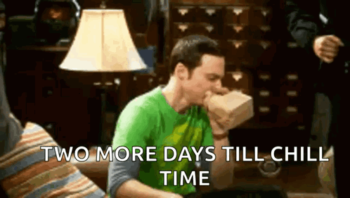 A Man In A Green Shirt Is Sitting On A Couch With A Box In His Mouth And The Words `` Two More Days Till Chill Time '' GIF