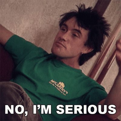 A Man In A Green Shirt With The Words No I 'M Serious GIF