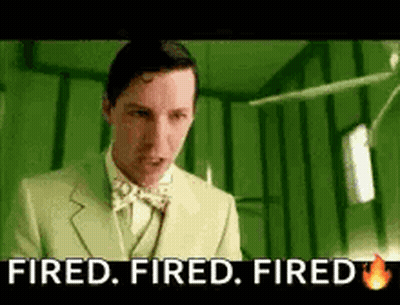 A Man In A Green Suit And Bow Tie Is Saying `` Fired . Fired . Fired . '' GIF