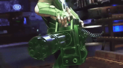 A Man In A Green Suit Is Standing In A Room With A Gun . GIF