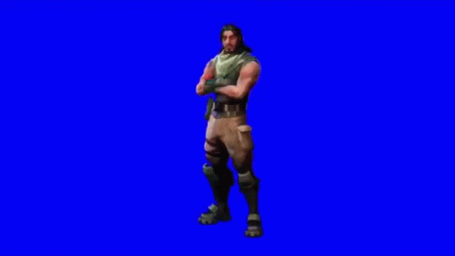 A Man In A Green Tank Top And Khaki Pants Is Standing On A Blue Screen . GIF