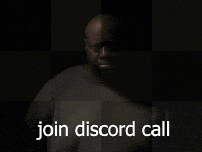 A Man In A Grey Shirt Says Join Discord Call In A Dark Room GIF