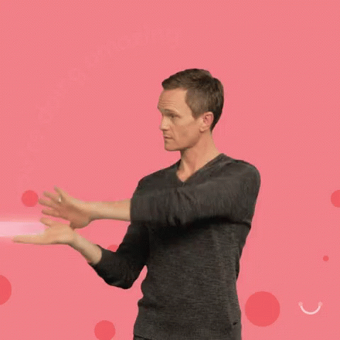 A Man In A Grey Sweater Is Holding A Rainbow In His Hand And Says You 'Re Doing Amazing . GIF