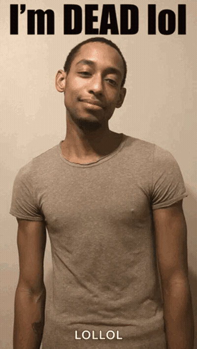 A Man In A Grey T-Shirt With The Words I 'M Dead Lol On It GIF