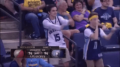 A Man In A Grizzlies Jersey Stands In The Stands GIF
