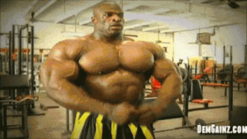 A Man In A Gym With The Website Dengainz.com GIF