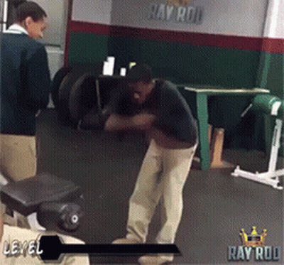 A Man In A Gym With The Word Ray Rod On The Bottom GIF
