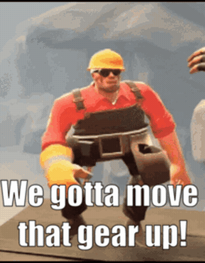 A Man In A Hard Hat And Overalls Says We Gotta Move That Gear Up ! GIF