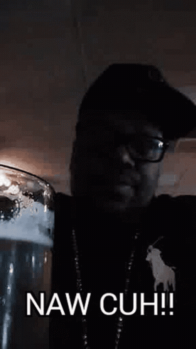A Man In A Hat And Glasses Is Holding A Glass Of Beer And Says Naw Cuh ! GIF