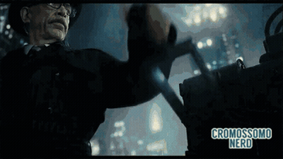 A Man In A Hat And Glasses Is Holding A Gun And The Words Cromosomo Nerd Are On The Bottom Of The Screen GIF