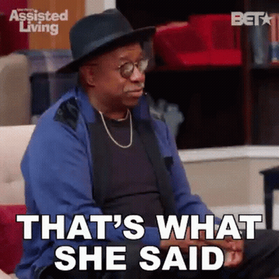 A Man In A Hat And Glasses Is Sitting On A Couch And Says `` That 'S What She Said '' . GIF