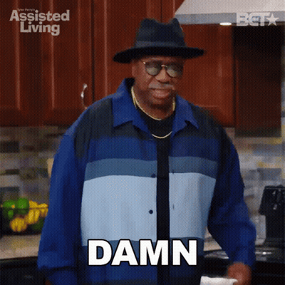 A Man In A Hat And Sunglasses Says Damn GIF