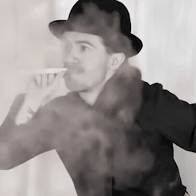 A Man In A Hat Is Drinking From A Cup With Smoke Coming Out Of His Mouth . GIF