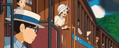 A Man In A Hat Is Looking Out Of A Train Car GIF