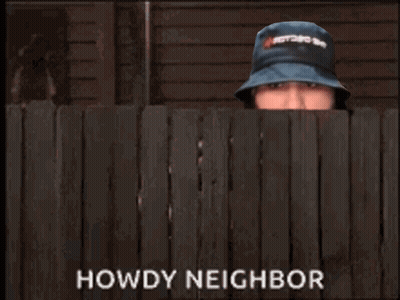 A Man In A Hat Is Peeking Over A Wooden Fence And The Words Howdy Neighbor Are Above Him GIF