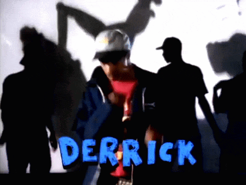 A Man In A Hat Is Standing In Front Of A Group Of People And The Name Derrick Is Written In Blue GIF