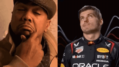 A Man In A Hat Is Thinking Next To A Man In A Red Bull Racing Uniform GIF