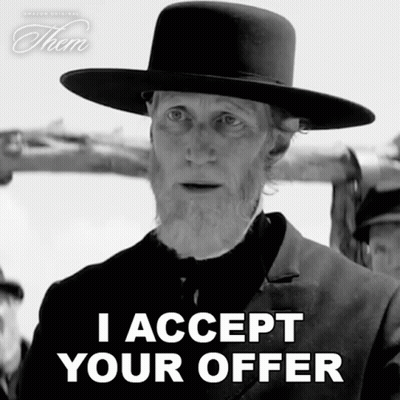 A Man In A Hat Says " I Accept Your Offer " In A Black And White Photo GIF