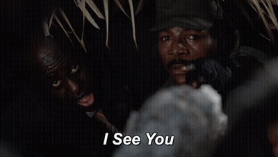 A Man In A Hat Says " I See You " To Another Man GIF