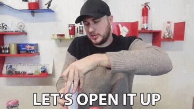 A Man In A Hat Says Let 'S Open It Up While Holding Something GIF