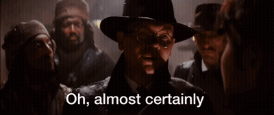 A Man In A Hat Says Oh Almost Certainly In Front Of A Group Of Men GIF