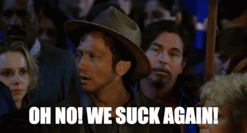A Man In A Hat Says Oh No We Suck Again In A Crowd GIF