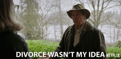 A Man In A Hat Talks To A Woman With The Words Divorce Wasn 'T My Idea GIF