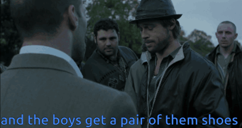 A Man In A Hat Talks To Another Man With The Words " And The Boys Get A Pair Of Them Shoes " Above Him GIF