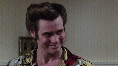 A Man In A Hawaiian Shirt Is Making A Sad Face GIF