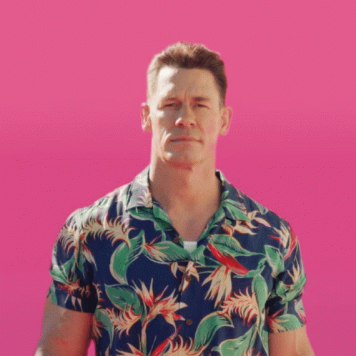 A Man In A Hawaiian Shirt Stands Next To A Bottle Of Major Melon GIF