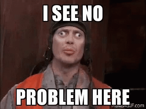 A Man In A Helmet Is Making A Funny Face And Saying `` I See No Problem Here `` . GIF