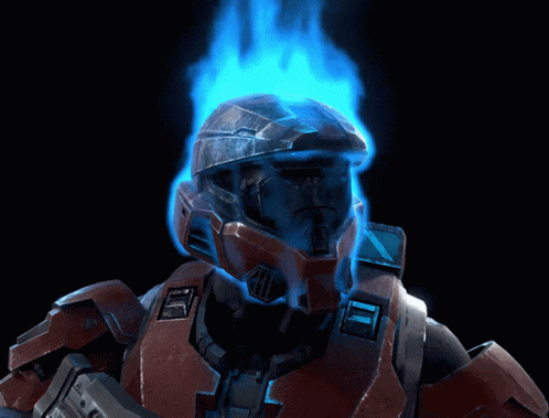 A Man In A Helmet With A Blue Fire Coming Out Of His Head GIF