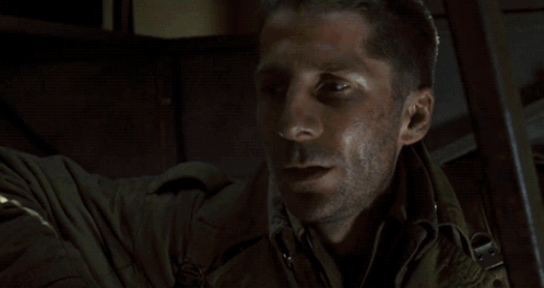 A Man In A Helmet With The Letters U.s. Army On His Chest GIF