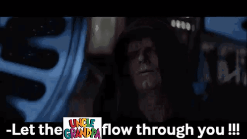 A Man In A Hood Is Standing In Front Of A Wheel And Says Let The Grandpa Flow Through You . GIF