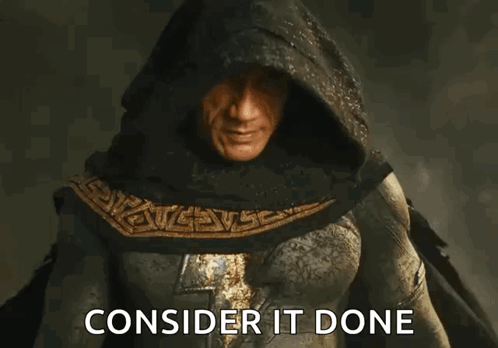 A Man In A Hooded Cape With The Words Consider It Done Written Below Him . GIF