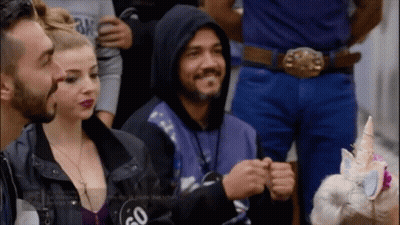 A Man In A Hooded Jacket Has The Number 50 On His Back GIF