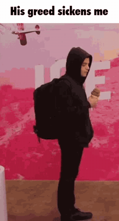 A Man In A Hooded Jacket Is Holding An Ice Cream Cone . GIF