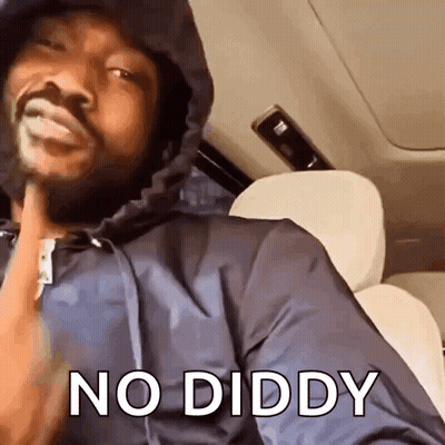 A Man In A Hooded Jacket Is Sitting In The Back Seat Of A Car With His Hand On His Chin . GIF