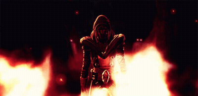A Man In A Hooded Jacket Is Surrounded By Flames And Smoke GIF