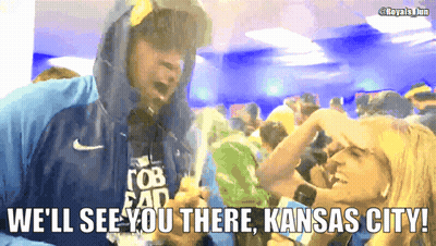 A Man In A Hooded Jacket Says We 'Ll See You There Kansas City In Front Of A Crowd Of People GIF